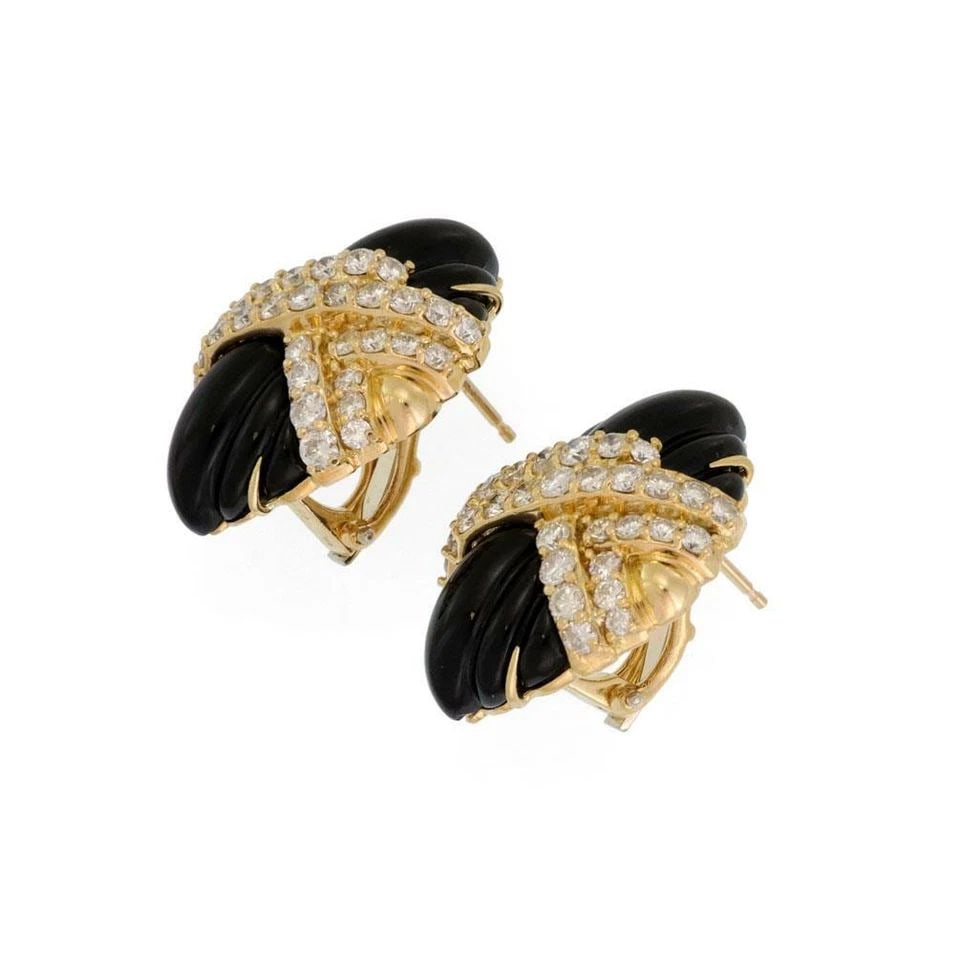 HAMMERMAN BROTHERS EARRINGS DIAMOND ONYX HUGGIE: HAMMERMAN BROTHERS EARRINGS DIAMOND ONYX HUGGIE HAMMERMAN BROTHERS EARRINGS DIAMOND ONYX HUGGIE The Hammerman Brothers Earrings are a luxurious pair of 18k yellow gold huggie earrings featuring a blac