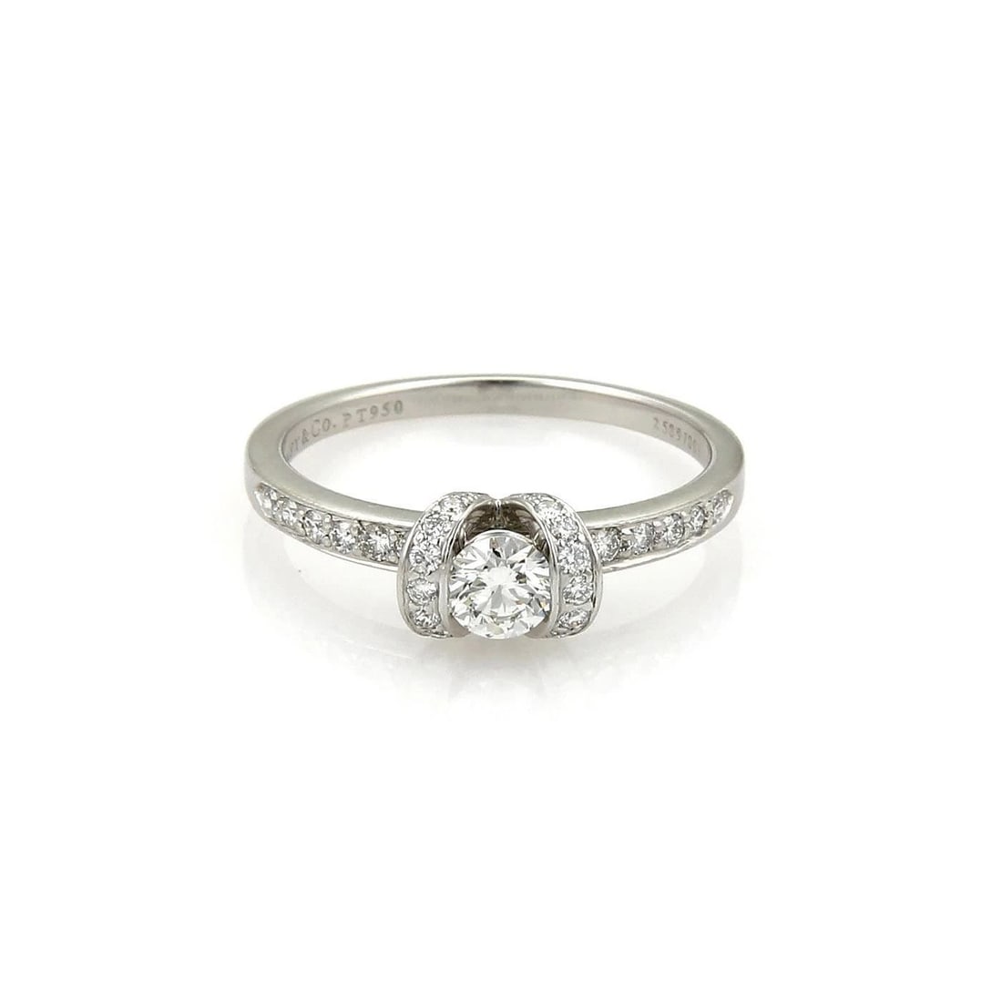 TIFFANY & CO. DIAMOND PLATINUM RING HALF BEZEL STYLE SIZE- 8.5: TIFFANY & CO. DIAMOND PLATINUM RING HALF BEZEL STYLE SIZE- 8.5 TIFFANY & CO. DIAMOND PLATINUM RING HALF BEZEL STYLE SIZE- 8.5 The Tiffany & Co. diamond platinum ring is a stunning piece of fine jewelr