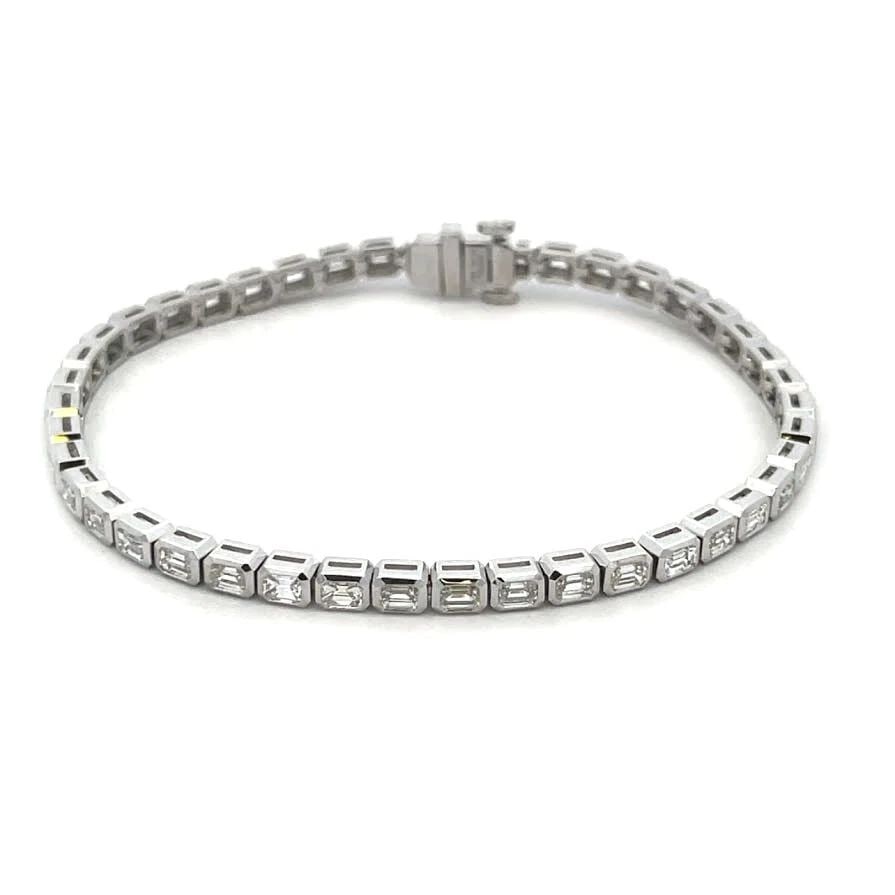 DIAMOND LINE TENNIS BRACELET EMERALD CUT 4.35CT 18K WHITE GOLD NEW: DIAMOND LINE TENNIS BRACELET EMERALD CUT 4.35CT 18K WHITE GOLD NEW DIAMOND LINE TENNIS BRACELET EMERALD CUT 4.35CT 18K WHITE GOLD NEW This is a gorgeous NEW line tennis bracelet. It is crafted from 18