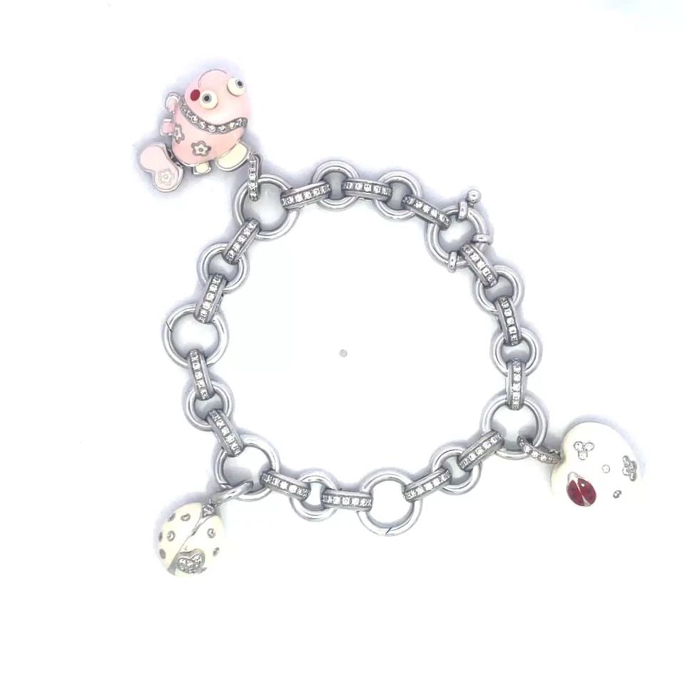 AARON BASHA DIAMOND GOLD BRACELET ENAMEL 18K WHITE 3 DANGLE CHARMS: AARON BASHA DIAMOND GOLD BRACELET ENAMEL 18K WHITE 3 DANGLE CHARMS AARON BASHA DIAMOND GOLD BRACELET ENAMEL 18K WHITE 3 DANGLE CHARMS Authentic and adorable from designer Aaron Basha, this charming di