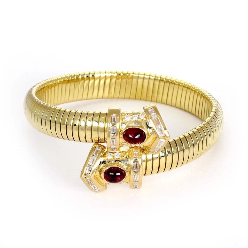 SNAKE 18K BRACELET DIAMOND & RUBY YELLOW GOLD FLEX CUFF: SNAKE 18K BRACELET DIAMOND & RUBY YELLOW GOLD FLEX CUFF SNAKE 18K BRACELET DIAMOND & RUBY YELLOW GOLD FLEX CUFF Snake Design Diamond & Ruby 18k Yellow Gold Flex Cuff Bracelet Description This stunning