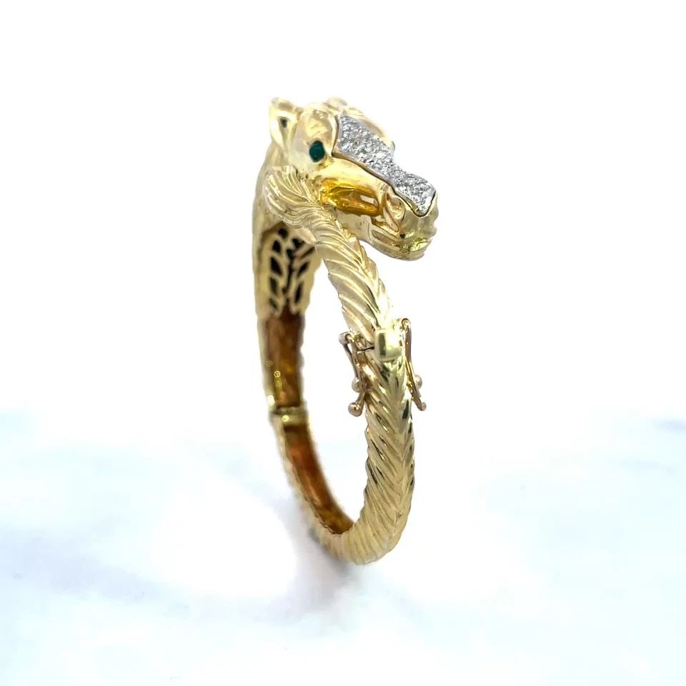 LA TRIOMPHE DIAMOND GOLD BRACELET 14K YELLOW HORSE HINGED BYPASS STYLE: LA TRIOMPHE DIAMOND GOLD BRACELET 14K YELLOW HORSE HINGED BYPASS STYLE LA TRIOMPHE DIAMOND GOLD BRACELET 14K YELLOW HORSE HINGED BYPASS STYLE This is a beautiful equestrian style bracelet; it is craft