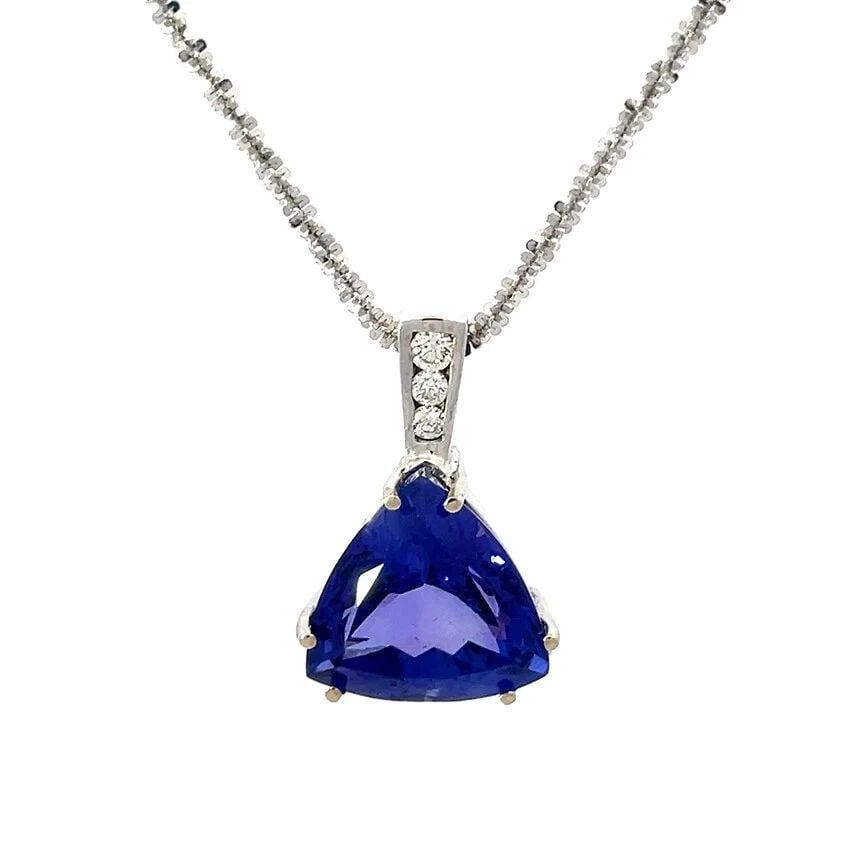 TANZANITE DIAMOND GOLD PENDANT 14K WHITE TRILLION W/CHAIN 17CT: TANZANITE DIAMOND GOLD PENDANT 14K WHITE TRILLION W/CHAIN 17CT TANZANITE DIAMOND GOLD PENDANT 14K WHITE TRILLION W/CHAIN 17CT This is a magnificent large trillion cut tanzanite stone, it is set on a t