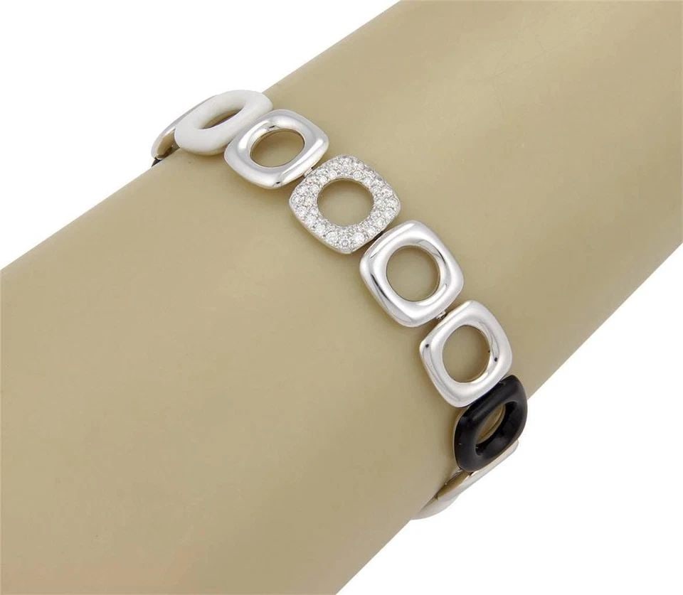 TIFFANY & CO. DIAMOND GOLD BRACELET 18K WHITE CERAMIC PAVE SET CUSHION LINKS: TIFFANY & CO. DIAMOND GOLD BRACELET 18K WHITE CERAMIC PAVE SET CUSHION LINKS TIFFANY & CO. DIAMOND GOLD BRACELET 18K WHITE CERAMIC PAVE SET CUSHION LINKS This gorgeous authentic bracelet from Tiffany 