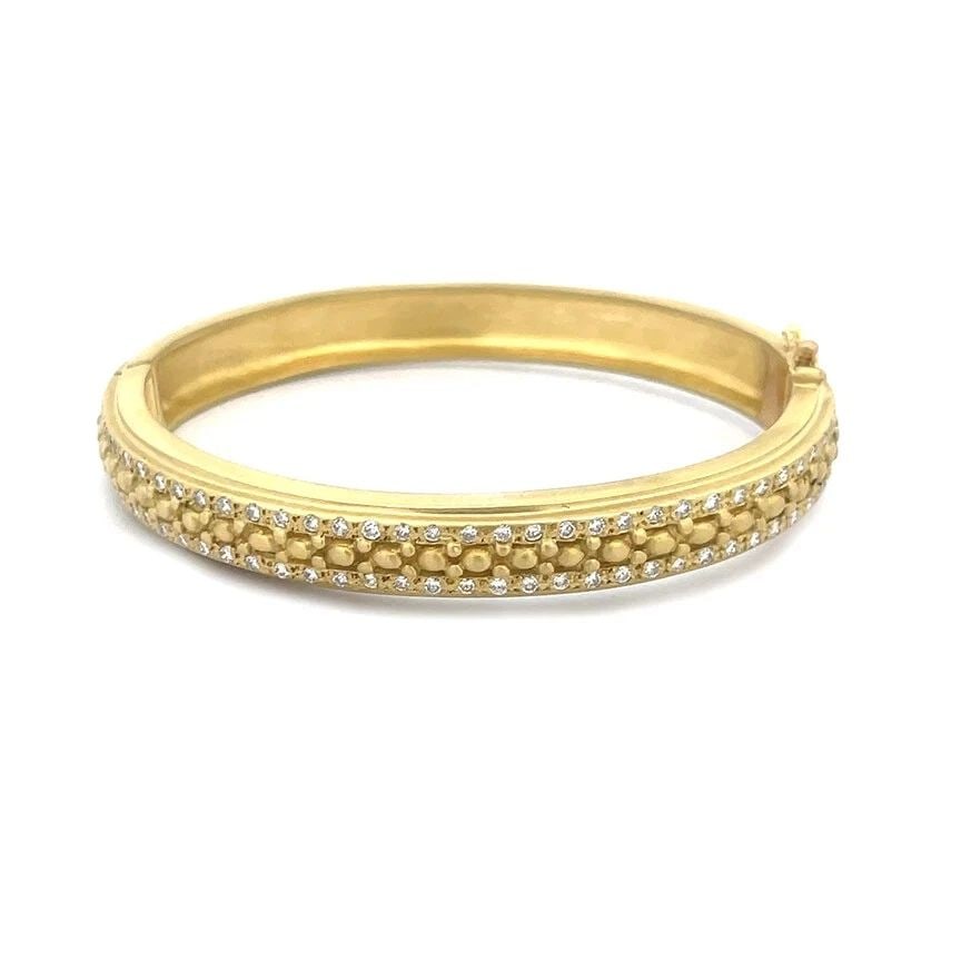 DORIS PANOS DIAMOND GOLD BRACELE 18K YELLOW HINGED BEAD STYLE ANGLE: DORIS PANOS DIAMOND GOLD BRACELE 18K YELLOW HINGED BEAD STYLE ANGLE DORIS PANOS DIAMOND GOLD BRACELE 18K YELLOW HINGED BEAD STYLE ANGLE This lovely authentic bracelet is crafted from 18k yellow gold i