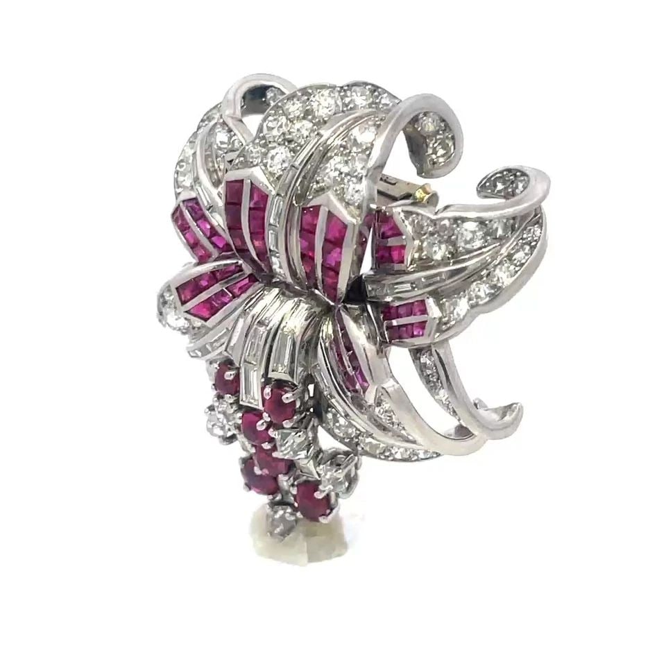 RUBY DIAMOND PLATINUM BROOCH 3.40CT FLORAL STYLE FRANCE: RUBY DIAMOND PLATINUM BROOCH 3.40CT FLORAL STYLE FRANCE RUBY DIAMOND PLATINUM BROOCH 3.40CT FLORAL STYLE FRANCE This is a magnificent flower brooch with French markings. It is crafted from platinum fe