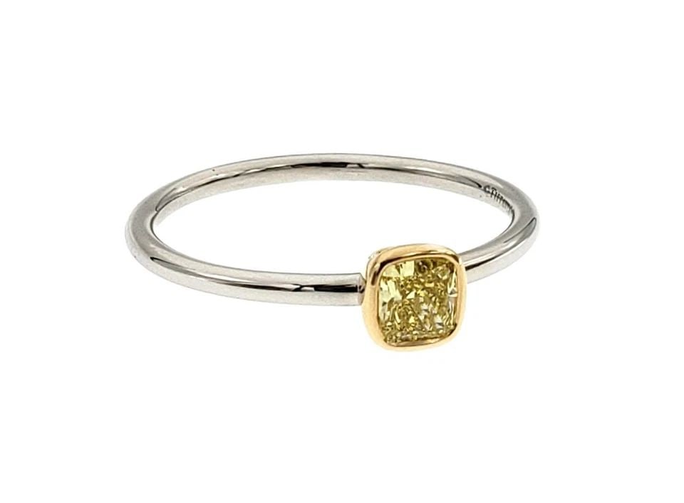 TIFFANY & CO DIAMOND BEZET RING PLATINUM 18K: TIFFANY & CO DIAMOND BEZET RING PLATINUM 18K TIFFANY & CO DIAMOND BEZET RING PLATINUM 18K The Tiffany & Co Diamond Bezet Ring in Platinum 18k is a stunning engagement or anniversary ring featuring a s