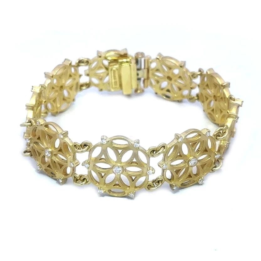 SAM LEHR DIAMOND GOLD BRACELET 18K YELLOW CIRCLE FLORAL FILIGREE LINK STYLE: SAM LEHR DIAMOND GOLD BRACELET 18K YELLOW CIRCLE FLORAL FILIGREE LINK STYLE The Sam Lehr Diamond Gold Bracelet is a stunning piece of fine jewelry featuring round floral fliligree links in 18k yellow 
