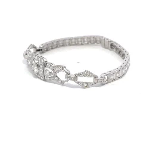 ART DECO DIAMOND BRACELET 1.80CT PLATINUM FANCY CENTERPIECE: ART DECO DIAMOND BRACELET 1.80CT PLATINUM FANCY CENTERPIECE ART DECO DIAMOND BRACELET 1.80CT PLATINUM FANCY CENTERPIECE This stunning Art Deco bracelet is crafted from platinum featuring a 3 inches lo