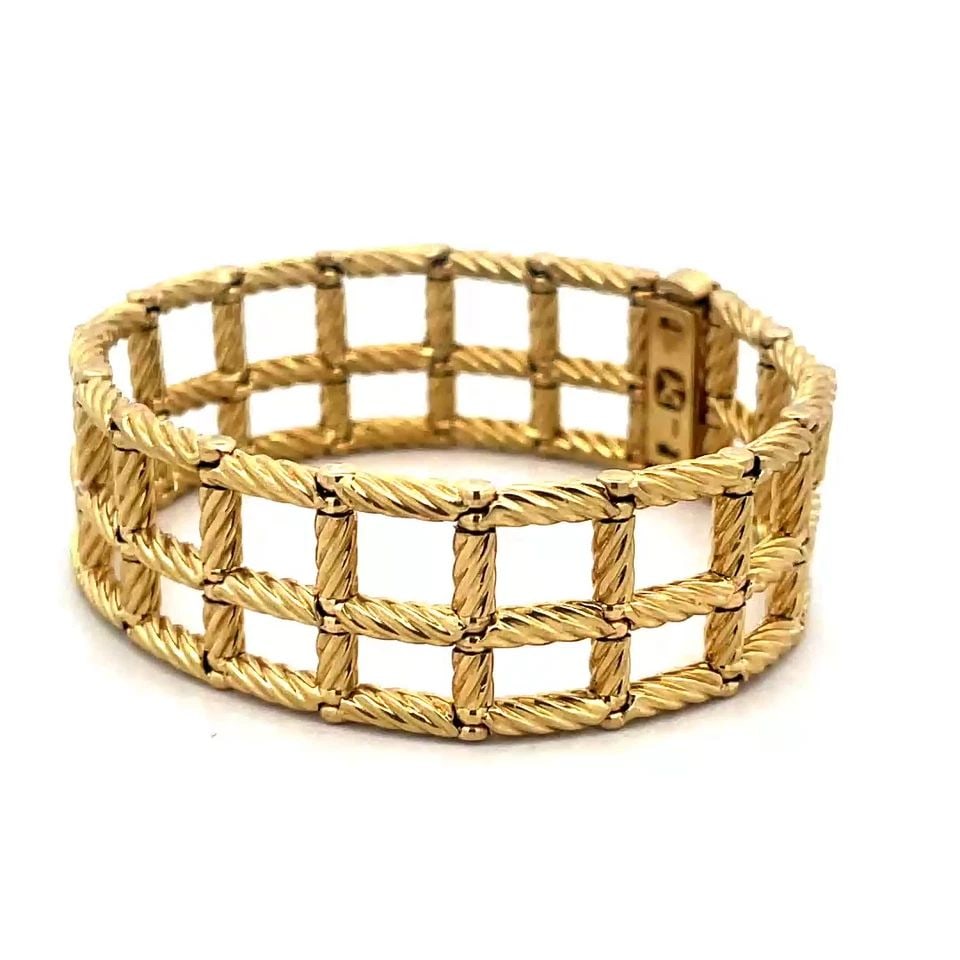 DAVID YURMAN GOLD BRACELET GRID WRAP LINK 18K YELLOW OPEN STYLE: DAVID YURMAN GOLD BRACELET GRID WRAP LINK 18K YELLOW OPEN STYLE DAVID YURMAN GOLD BRACELET GRID WRAP LINK 18K YELLOW OPEN STYLE Elevate your jewelry collection with the exquisite bracelet by David Yur