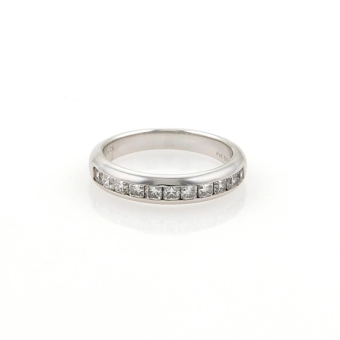 TIFFANY & CO. LUCIDA DIAMONDS PLATINUM RING PRINCESS CUT HALF CIRCLE: TIFFANY & CO. LUCIDA DIAMONDS PLATINUM RING PRINCESS CUT HALF CIRCLE TIFFANY & CO. LUCIDA DIAMONDS PLATINUM RING PRINCESS CUT HALF CIRCLE The Tiffany & Co. Lucida Diamonds Platinum Ring features a stu