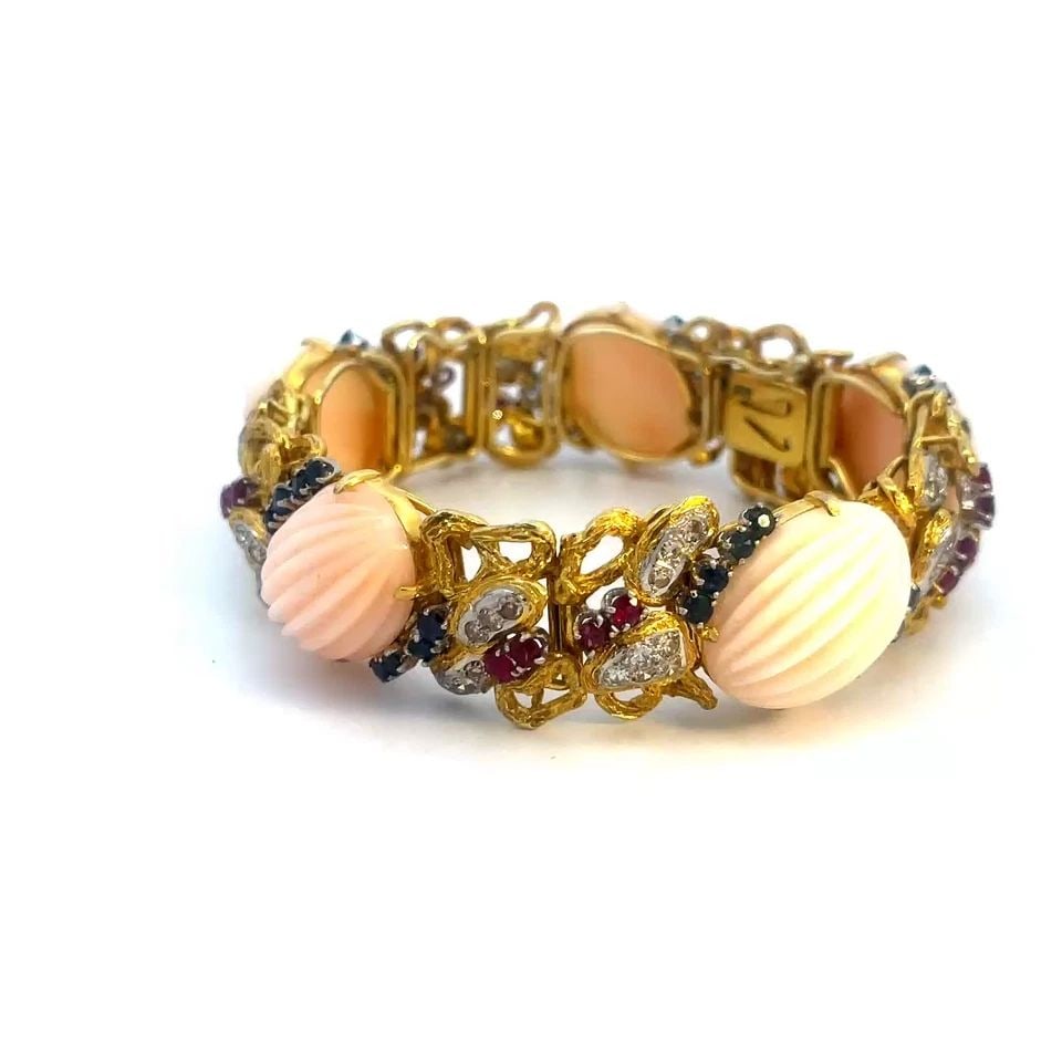 DIAMOND GOLD CORAL BRACELET GEMSTONE 14K TWO TONE FANCY LINK: DIAMOND GOLD CORAL BRACELET GEMSTONE 14K TWO TONE FANCY LINK DIAMOND GOLD CORAL BRACELET GEMSTONE 14K TWO TONE FANCY LINK This eye-catching 14k gold vintage bracelet features a stunning combination of