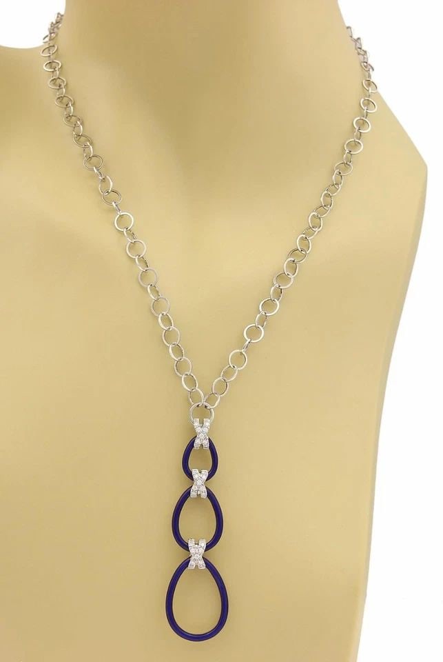 FABERGE DIAMOND GOLD NECKLACE 18K WHITE ENAMEL TRIPLE LOOP PENDANT: FABERGE DIAMOND GOLD NECKLACE 18K WHITE ENAMEL TRIPLE LOOP PENDANT FABERGE DIAMOND GOLD NECKLACE 18K WHITE ENAMEL TRIPLE LOOP PENDANT The Faberge Diamond Gold Necklace is a stunning piece of fine jewe