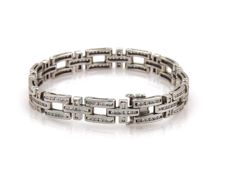 14K WHITE GOLD 5.50CTW DIAMOND OPEN BAR & CROSS LINK 9MM WIDE BRACELET: 14K WHITE GOLD 5.50CTW DIAMOND OPEN BAR & CROSS LINK 9MM WIDE BRACELET 14k White Gold 5.50ctw Diamond Open Bar & Cross Link 9mm Wide Bracelet Description This beautiful Estate bracelet is crafted from