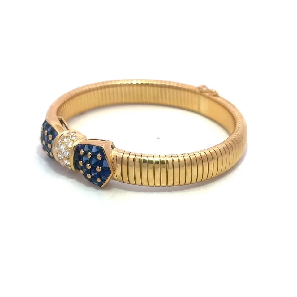 TIFFANY & CO. DIAMOND GOLD BRACELET 18K YELLOW SAPPHIRE BOW MOTIF FRANCE: TIFFANY & CO. DIAMOND GOLD BRACELET 18K YELLOW SAPPHIRE BOW MOTIF FRANCE TIFFANY & CO. DIAMOND GOLD BRACELET 18K YELLOW SAPPHIRE BOW MOTIF FRANCE This lovey gold bracelet is from Tiffany & Co. France,