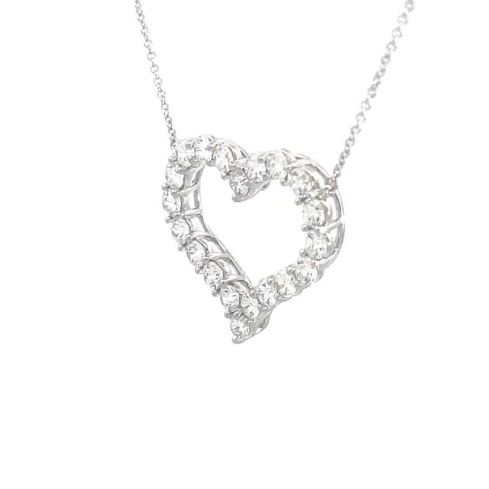 TIFFANY & CO. DIAMOND HEART NECKLACE PLATINUM PRONG SET OPEN STYLE BOX: TIFFANY & CO. DIAMOND HEART NECKLACE PLATINUM PRONG SET OPEN STYLE BOX TIFFANY & CO. DIAMOND HEART NECKLACE PLATINUM PRONG SET OPEN STYLE BOX The product is a stunning Tiffany & Co. diamond necklace f