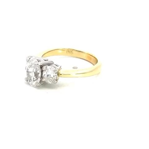 DIAMOND SOLITAIRE OVAL RING W/ACCENT 1.75CT 14K TWO TONE GOLD: DIAMOND SOLITAIRE OVAL RING W/ACCENT 1.75CT 14K TWO TONE GOLD DIAMOND SOLITAIRE OVAL RING W/ACCENT 1.75CT 14K TWO TONE GOLD This gorgeous diamond ring is crafted from 14k yellow gold shank and band wi