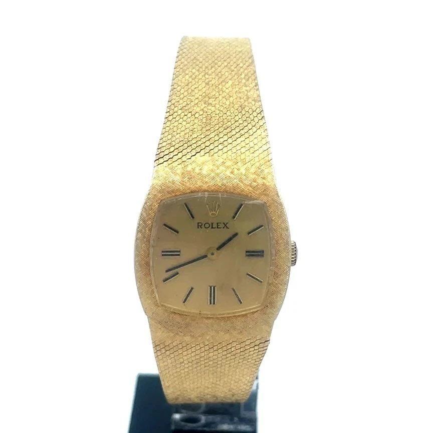 ROLEX VINTAGE GOLD WRISTWATCH 14K YELLOW MANUAL WIND WOMEN: ROLEX VINTAGE GOLD WRISTWATCH 14K YELLOW MANUAL WIND WOMEN ROLEX VINTAGE GOLD WRISTWATCH 14K YELLOW MANUAL WIND WOMEN This is a vintage Rolex wristwatch for women with14k yellow gold case attached to 