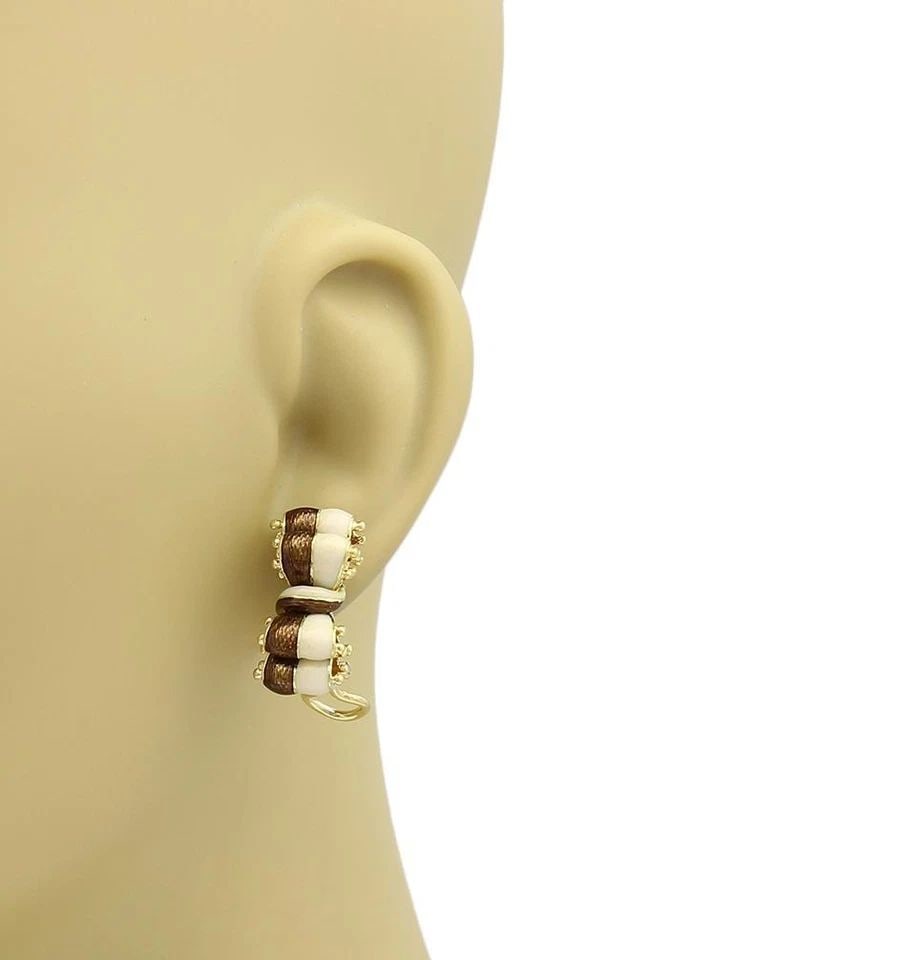 TIFFANY & CO. 18K YELLOW GOLD & ENAMEL DOUBLE RIBBOW BOW POST CLIP EARRINGS: TIFFANY & CO. 18K YELLOW GOLD & ENAMEL DOUBLE RIBBOW BOW POST CLIP EARRINGS TIFFANY & CO. 18K YELLOW GOLD & ENAMEL DOUBLE RIBBOW BOW POST CLIP EARRINGS Tiffany & Co. Enamel 18k Yellow Gold Double