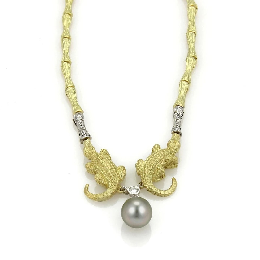 DIAMOND GOLD PEARL NECKLACE 18K YELLOW ALLIGATOR LOG MOTIF BAMBOO LINKS: DIAMOND GOLD PEARL NECKLACE 18K YELLOW ALLIGATOR LOG MOTIF BAMBOO LINKS DIAMOND GOLD PEARL NECKLACE 18K YELLOW ALLIGATOR LOG MOTIF BAMBOO LINKS This unique combination of natural elements features an 