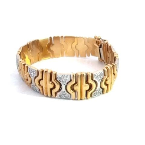 DIAMOND GOLD BRACELET 14K TWO TONE PARENTESI STYLE LINK: DIAMOND GOLD BRACELET 14K TWO TONE PARENTESI STYLE LINK DIAMOND GOLD BRACELET 14K TWO TONE PARENTESI STYLE LINK This chic and fashionable bracelet is crafted from 14k yellow and white gold, it is 14mm