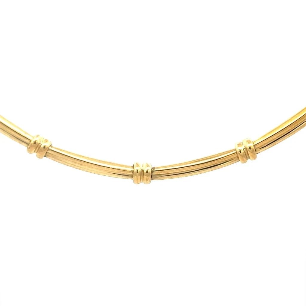TIFFANY & CO. GOLD COLLAR NECKLACE 18K YELLOW GROOVED NECKLACE: TIFFANY & CO. GOLD COLLAR NECKLACE 18K YELLOW GROOVED NECKLACE TIFFANY & CO. GOLD COLLAR NECKLACE 18K YELLOW GROOVED NECKLACE The Tiffany & Co. gold collar necklace is a stunning piece of fine jewelry