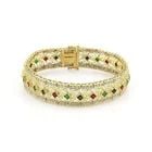 DIAMOND & GEMS GOLD BRACELET 14K YELLOW WIDE FILIGREE STYLE: DIAMOND & GEMS GOLD BRACELET 14K YELLOW WIDE FILIGREE STYLE DIAMOND & GEMS GOLD BRACELET 14K YELLOW WIDE FILIGREE STYLE This is a lovely, impressive Estate bracelet is crafted from 14k yellow gold wit