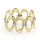 DIAMOND GOLD BRACELET 18K YELLOW TRIPLE OVAL HOOP LINK FLEX STYLE: DIAMOND GOLD BRACELET 18K YELLOW TRIPLE OVAL HOOP LINK FLEX STYLE DIAMOND GOLD BRACELET 18K YELLOW TRIPLE OVAL HOOP LINK FLEX STYLE This lovely diamond gold bracelet features a classic design with a f