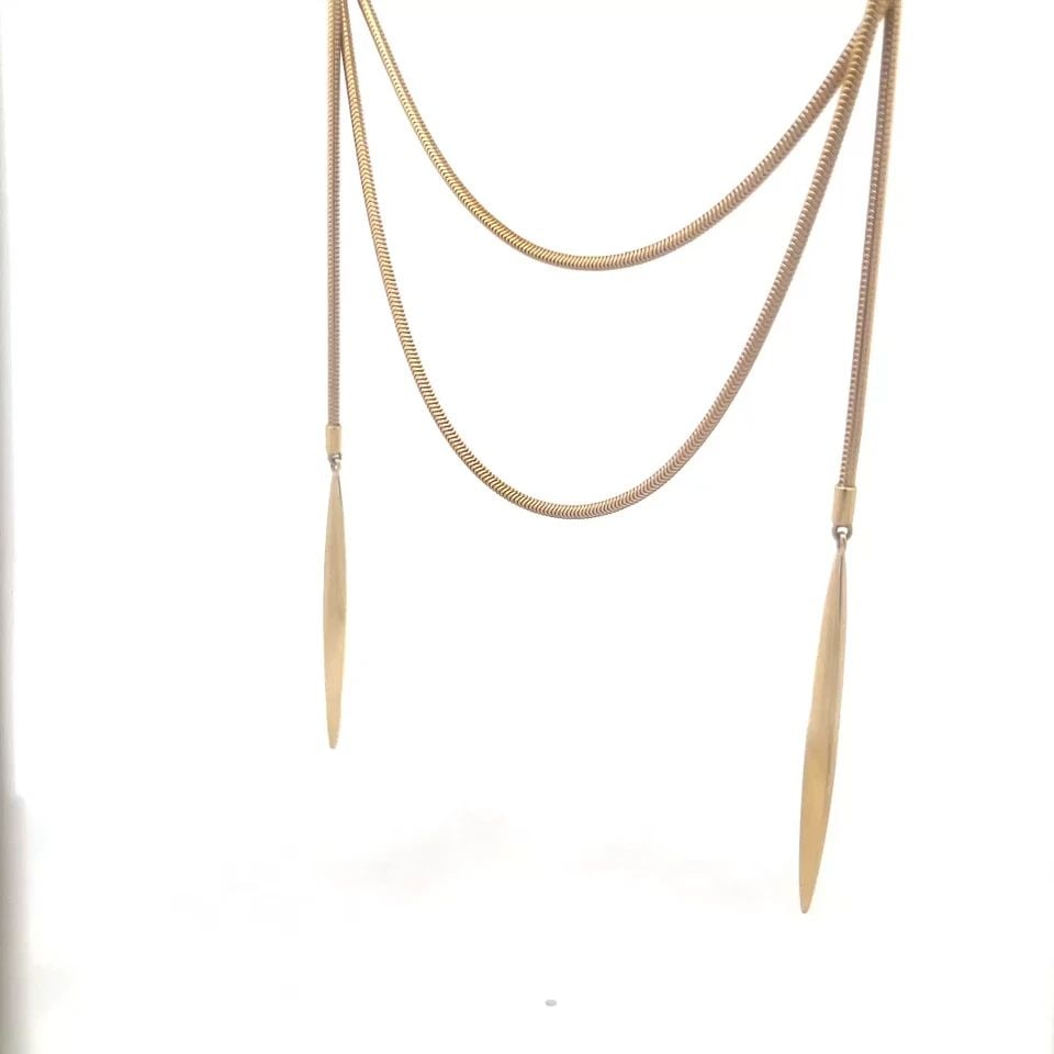 TIFFANY & CO. GOLD FEATHER LARIAT NECKLACE 18K YELLOW DOUBLE PENDANT OR BELT: TIFFANY & CO. GOLD FEATHER LARIAT NECKLACE 18K YELLOW DOUBLE PENDANT OR BELT TIFFANY & CO. GOLD FEATHER LARIAT NECKLACE 18K YELLOW DOUBLE PENDANT OR BELT This is a vintage Tiffany & Co. necklace or be