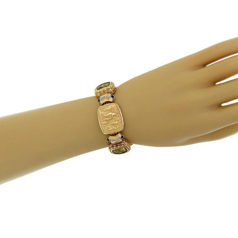 14K BRACELET FIGURE PANEL MYTHOLOGICAL SCENE WITH DIAMONDS AND GEMSTONES: 14K BRACELET FIGURE PANEL MYTHOLOGICAL SCENE WITH DIAMONDS AND GEMSTONES 14K BRACELET FIGURE PANEL MYTHOLOGICAL SCENE WITH DIAMONDS AND GEMSTONES Estate Diamond Gems 14k Two Tone Gold 3 Figure Panel W