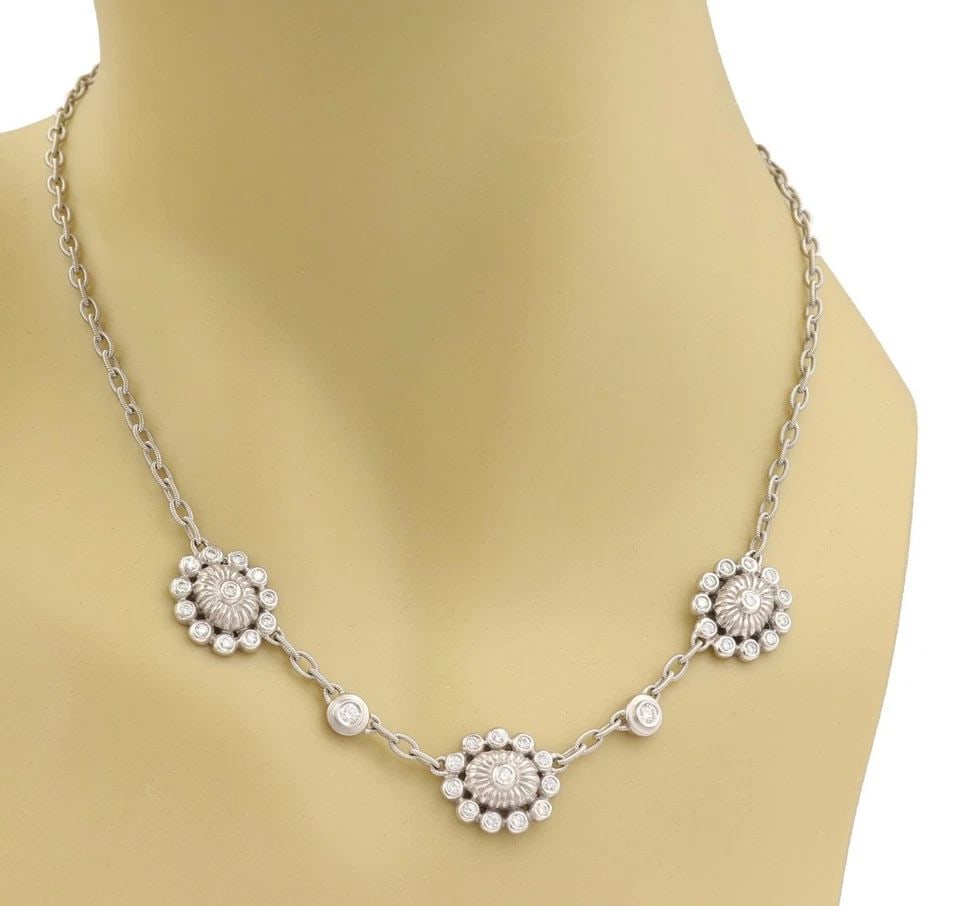 DORIS PANOS 1.20CT DIAMOND FLORAL CHAIN NECKLACE: DORIS PANOS 1.20CT DIAMOND FLORAL CHAIN NECKLACE DORIS PANOS 1.20CT DIAMOND FLORAL CHAIN NECKLACE Doris Panos 1.20ct Diamond Floral Chain Necklace Description This lovely authentic necklace is by desi