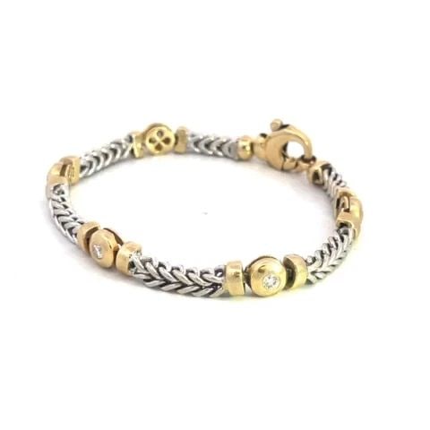 DIAMOND GOLD BRACELET 14K HEAVY TWO-TONE CHEVRON DOT LINK STYLE: DIAMOND GOLD BRACELET 14K HEAVY TWO-TONE CHEVRON DOT LINK STYLE DIAMOND GOLD BRACELET 14K HEAVY TWO-TONE CHEVRON DOT LINK STYLE This elegant bracelet is crafted from 14k yellow and white gold featurin