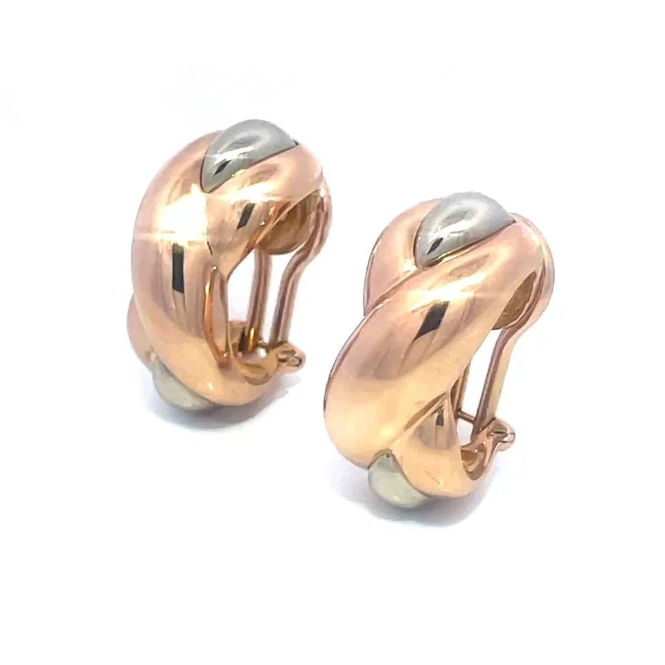 CARTIER TRINITY GOLD EARRINGS 18K TRI-COLOR CLIP ON HUGGIE STYLE: CARTIER TRINITY GOLD EARRINGS 18K TRI-COLOR CLIP ON HUGGIE STYLE These lovely earrings are by Cartier from the Trinity Collection, the pair is crafted from 18k pink, yellow and white gold with the whi