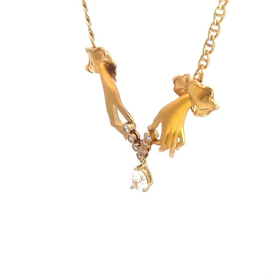 CARRERA Y CARRERA DIAMOND GOLD NECKLACE 18K YELLOW HAPPY HANDS PENDANT: CARRERA Y CARRERA DIAMOND GOLD NECKLACE 18K YELLOW HAPPY HANDS PENDANT CARRERA Y CARRERA DIAMOND GOLD NECKLACE 18K YELLOW HAPPY HANDS PENDANT This stunning Carrera y Carrera necklace is a piece of fin