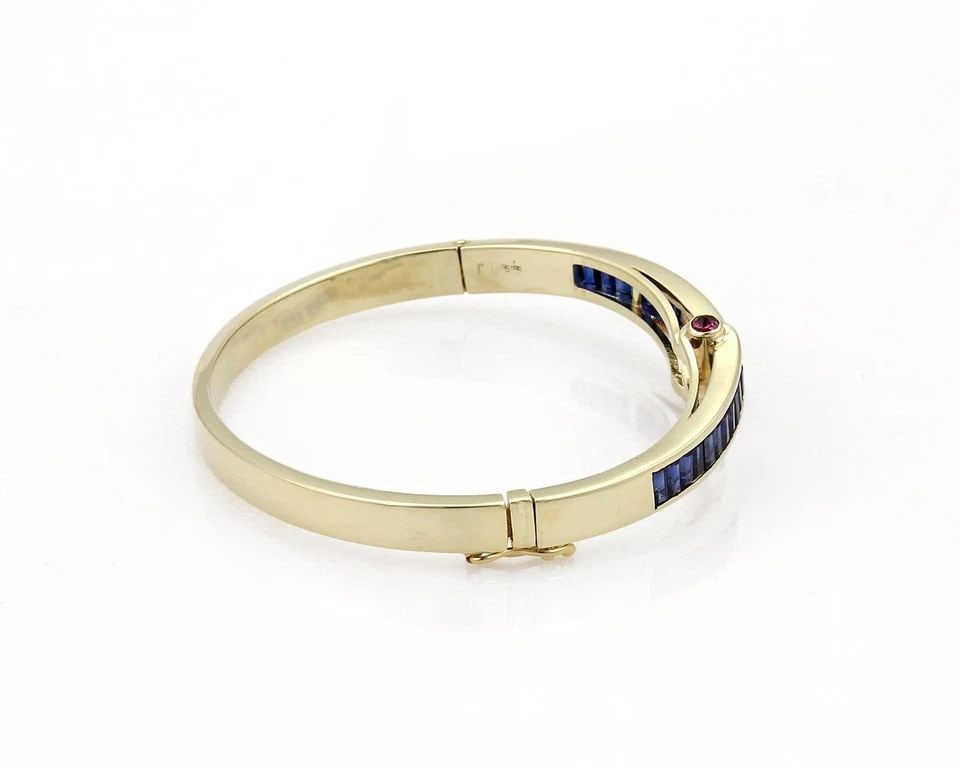 ESTATE 5.40CT SAPPHIRE & RUBY 14K YELLOW GOLD FANCY BANGLE BRACELET: ESTATE 5.40CT SAPPHIRE & RUBY 14K YELLOW GOLD FANCY BANGLE BRACELET ESTATE 5.40CT SAPPHIRE & RUBY 14K YELLOW GOLD FANCY BANGLE BRACELET Estate 5.40ct Sapphire & Ruby 14k Yellow Gold Fancy Bangle Brace