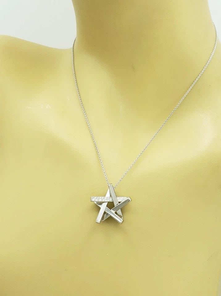 TIFFANY & CO. GEHRY AXIS DIAMONDS 18K WHITE GOLD STAR PENDANT NECKLACE: TIFFANY & CO. GEHRY AXIS DIAMONDS 18K WHITE GOLD STAR PENDANT NECKLACE TIFFANY & CO. GEHRY AXIS DIAMONDS 18K WHITE GOLD STAR PENDANT NECKLACE 66409 Tiffany & Co. Gehry Axis Diamonds 18k White Gold Sta