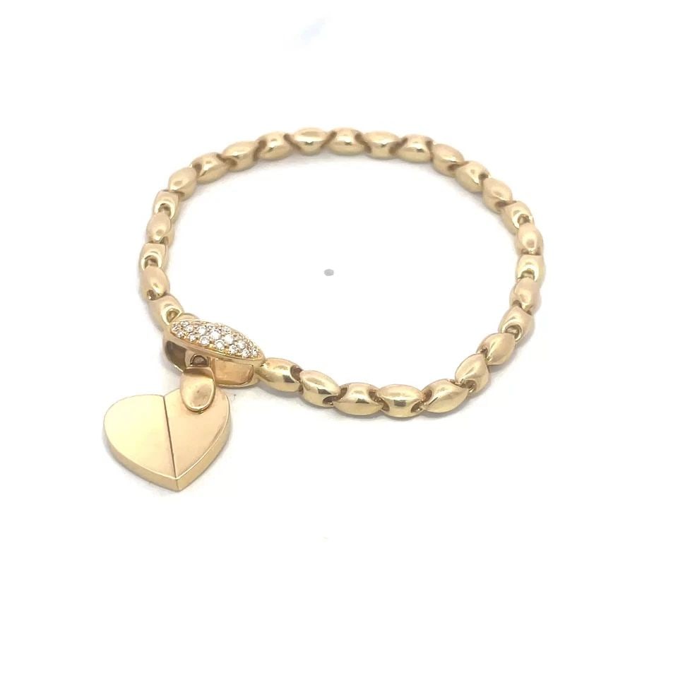 PIAGET DIAMOND GOLD BRACELET 18K YELLOW PUFFED LINKS TWIST CLASP: PIAGET DIAMOND GOLD BRACELET 18K YELLOW PUFFED LINKS TWIST CLASP PIAGET DIAMOND GOLD BRACELET 18K YELLOW PUFFED LINKS TWIST CLASP The Piaget Diamond Gold Bracelet is a stunning piece crafted from 18k 