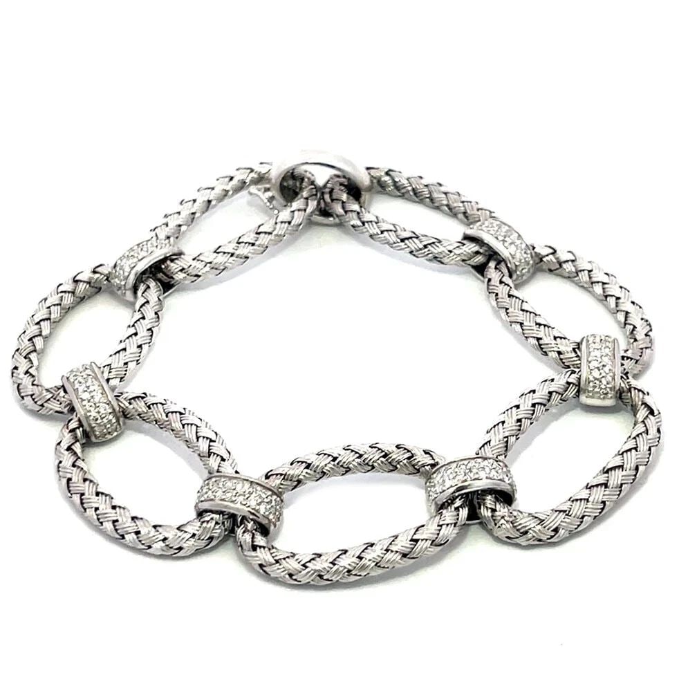 DIAMOND GOLD OVAL LINK BRACELET 18K WHITE SILK BASKET WEAVE STYLE: DIAMOND GOLD OVAL LINK BRACELET 18K WHITE SILK BASKET WEAVE STYLE DIAMOND GOLD OVAL LINK BRACELET 18K WHITE SILK BASKET WEAVE STYLE This chic fashionable bracelet is crafted from 14k white gold featur
