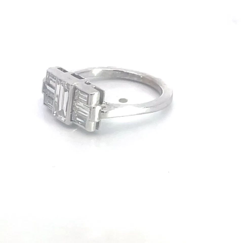 ART DECO DIAMOND RING PLATINUM GOLD RECTANGULAR CUT: ART DECO DIAMOND RING PLATINUM GOLD RECTANGULAR CUT ART DECO DIAMOND RING PLATINUM GOLD RECTANGULAR CUT This Art Deco Diamond Ring is a stunning piece of fine jewelry crafted with platinum and white g
