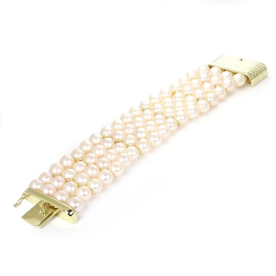 18K YELLOW GOLD 1 CARAT DIAMOND 4 STRAND 7MM PEARL BRACELET: 18K YELLOW GOLD 1 CARAT DIAMOND 4 STRAND 7MM PEARL BRACELET 18K YELLOW GOLD 1 CARAT DIAMOND 4 STRAND 7MM PEARL BRACELET 18k Yellow Gold 1ct Diamond 4 Strand 7mm Pearl Bracelet Description This is a go