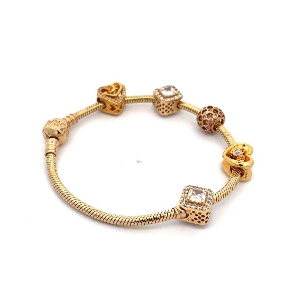 PANDORA 14K GOLD 5 SLIDE CHARMS SNAKE CHAIN BRACELET: PANDORA 14K GOLD 5 SLIDE CHARMS SNAKE CHAIN BRACELET PANDORA 14K GOLD 5 SLIDE CHARMS SNAKE CHAIN BRACELET This authentic and charming bracelet is by Pandora, crafted from 14k yellow gold featuring a 3