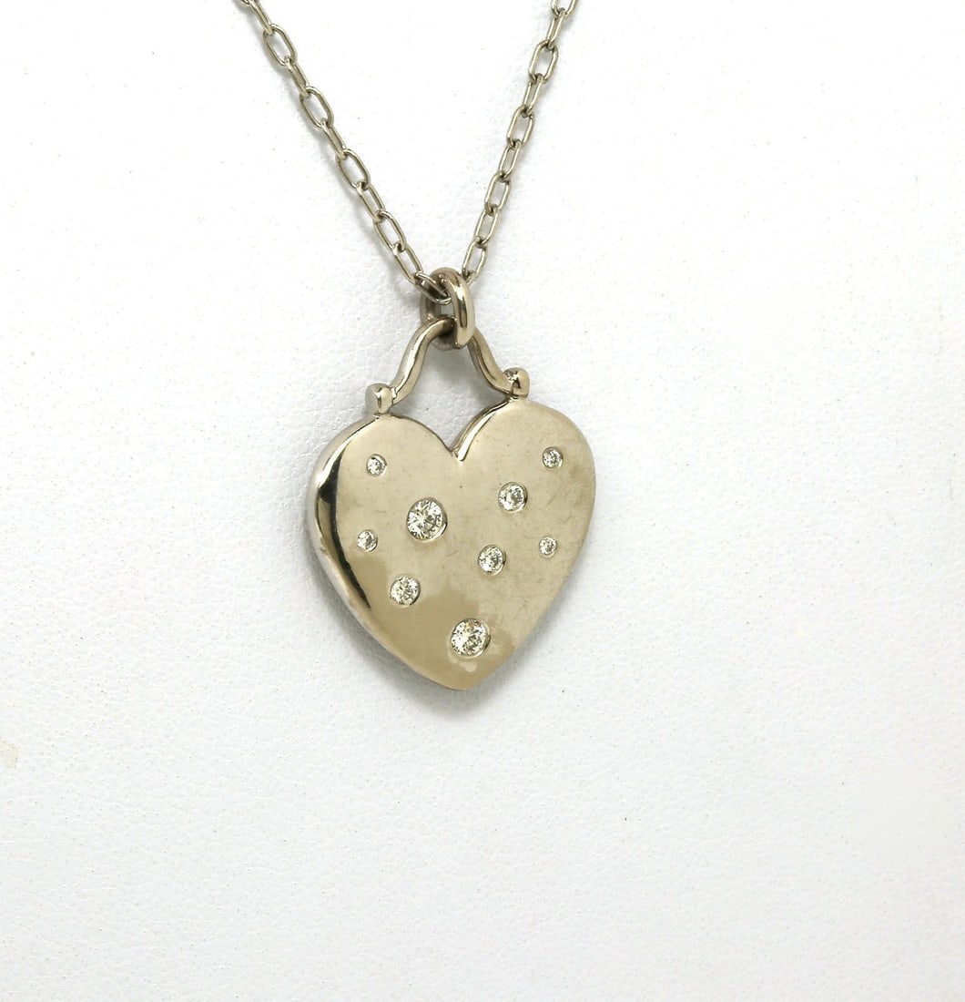 TIFFANY & CO. DIAMOND GOLD NECKLACE 18K WHITE HEART PENDANT & CHAIN: TIFFANY & CO. DIAMOND GOLD NECKLACE 18K WHITE HEART PENDANT & CHAIN TIFFANY & CO. DIAMOND GOLD NECKLACE 18K WHITE HEART PENDANT & CHAIN The Tiffany & Co. Diamond Gold Necklace is a stunning piece of f