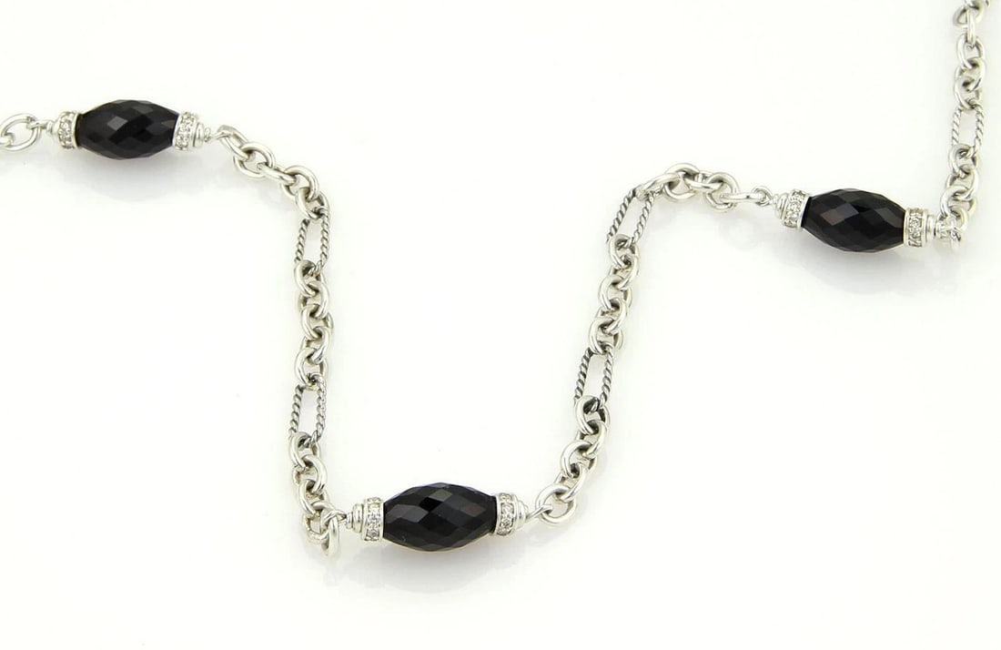DAVID YURMAN STERLING SILVER NECKLACE DIAMOND ONYX TOGGLE CLASP: DAVID YURMAN STERLING SILVER NECKLACE DIAMOND ONYX TOGGLE CLASP DAVID YURMAN STERLING SILVER NECKLACE DIAMOND ONYX TOGGLE CLASP The David Yurman Sterling Silver Necklace with a Diamond and Onyx Toggle
