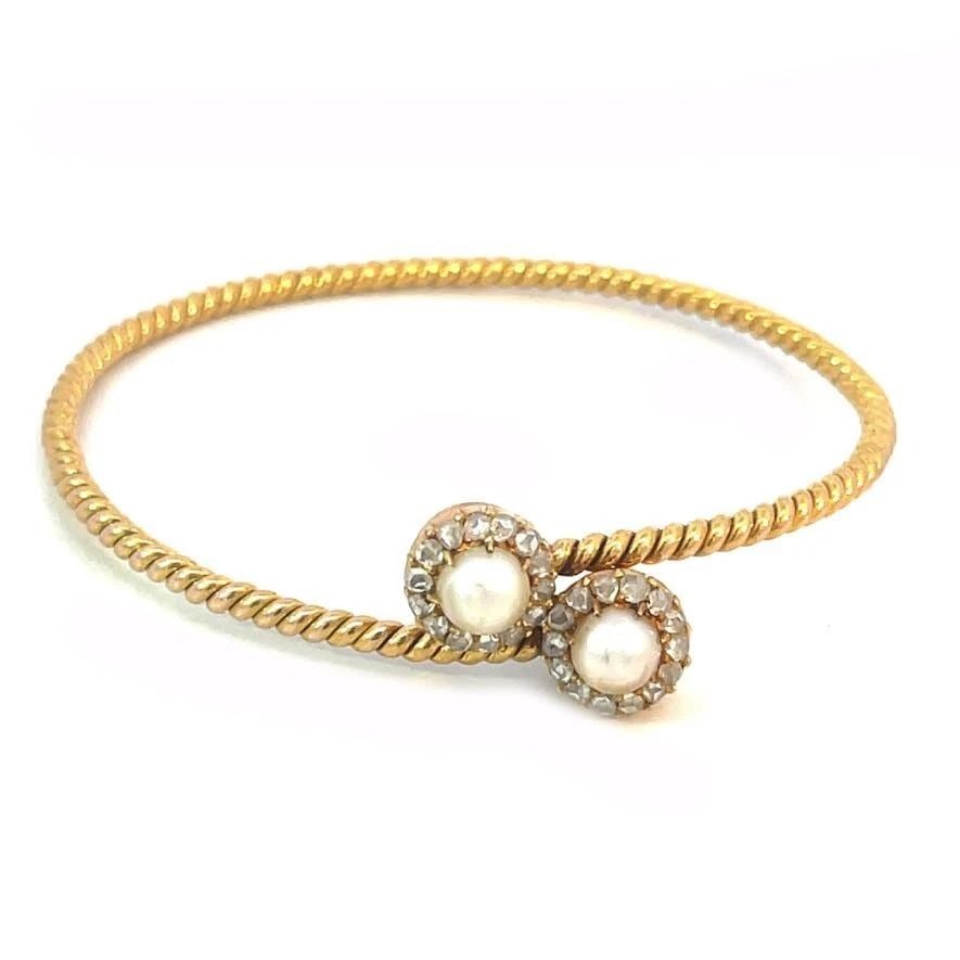 VICTORIAN ROSE CUT DIAMOND GOLD BANGLE 18K YELLOW PEARLS BYPASS STYLE: VICTORIAN ROSE CUT DIAMOND GOLD BANGLE 18K YELLOW PEARLS BYPASS STYLE VICTORIAN ROSE CUT DIAMOND GOLD BANGLE 18K YELLOW PEARLS BYPASS STYLE This beautiful Victorian Era bracelet is crafted from 18k ye