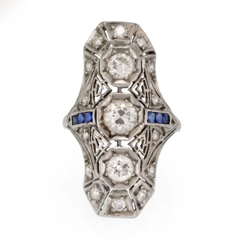 RING ART DECO DIAMOND GEMSTONE PLATINUM: RING ART DECO DIAMOND GEMSTONE PLATINUM RING ART DECO DIAMOND GEMSTONE PLATINUM This vintage Art Deco diamond ring features a prong setting style and is crafted in platinum, embodying the elegance and