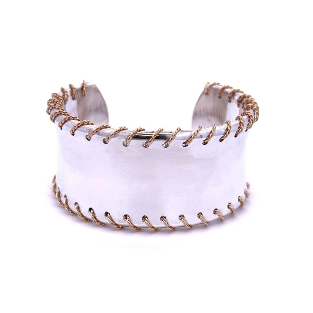 TIFFANY & CO. BRACELET STERLING SILVER 18K YELLOW GOLD 31MM WIDE CUFF: TIFFANY & CO. BRACELET STERLING SILVER 18K YELLOW GOLD 31MM WIDE CUFF TIFFANY & CO. BRACELET STERLING SILVER 18K YELLOW GOLD 31MM WIDE CUFF This chic modern style authentic cuff bracelet is from Tiffa