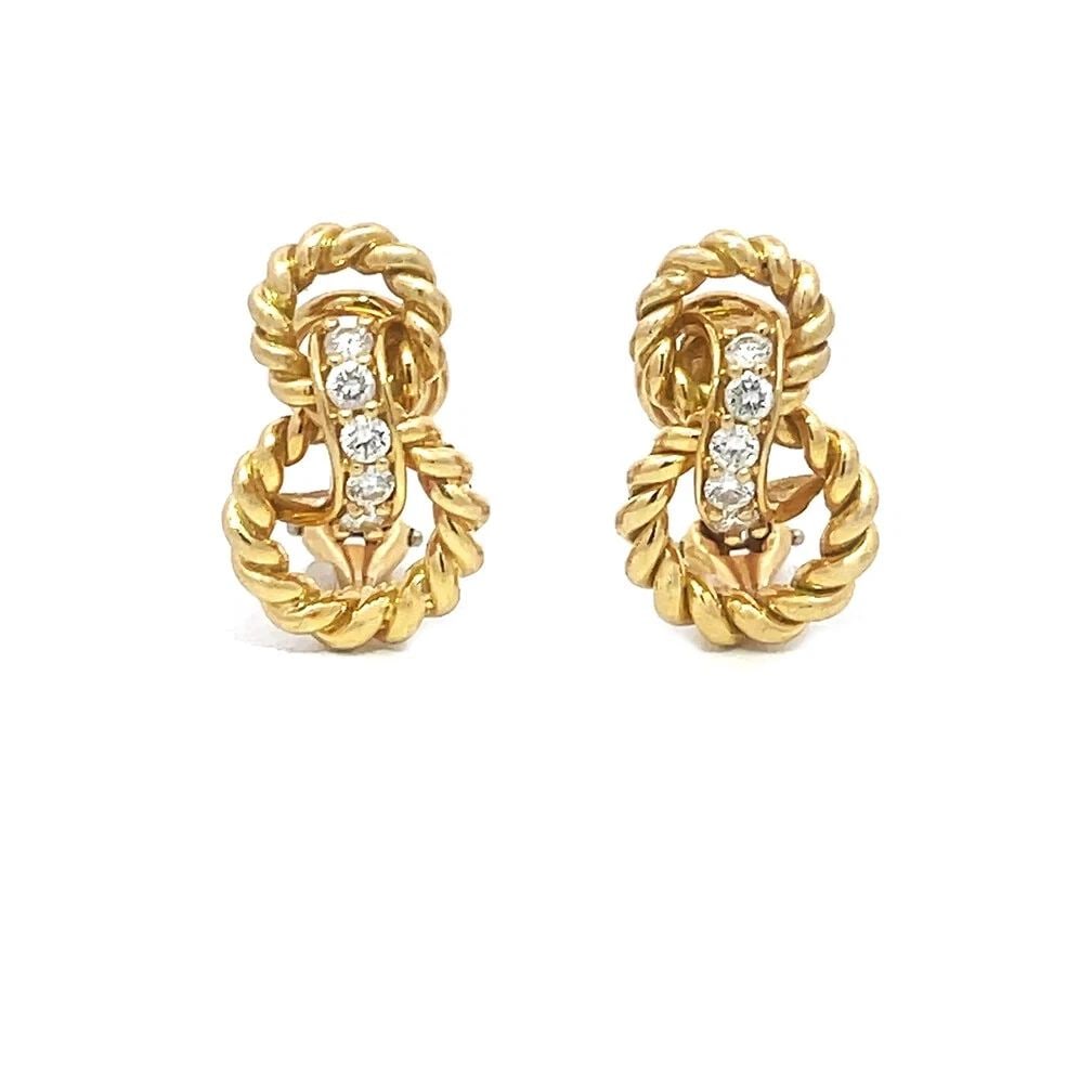 TIFFANY & CO. DIAMOND GOLD EARRINGS VINTAGE 18K YELLOW KNOT STYLE: TIFFANY & CO. DIAMOND GOLD EARRINGS VINTAGE 18K YELLOW KNOT STYLE TIFFANY & CO. DIAMOND GOLD EARRINGS VINTAGE 18K YELLOW KNOT STYLE These lovely authentic vintage earrings are from Tiffany & Co. They 