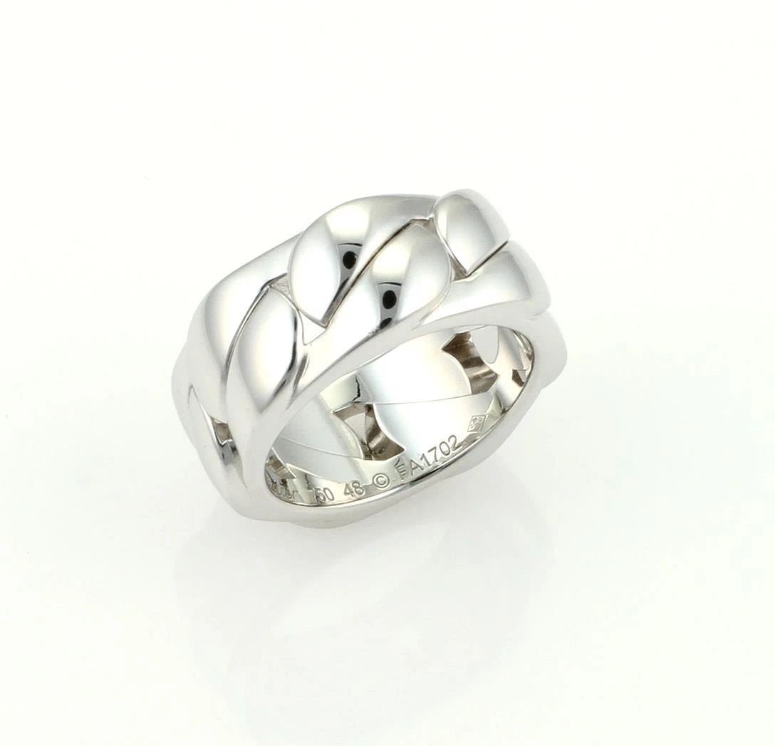 CARTIER GOLD RING 18K WHITE BRAIDED STYLE BAND SIZE 4.75 W/CERT: CARTIER GOLD RING 18K WHITE BRAIDED STYLE BAND SIZE 4.75 W/CERT CARTIER GOLD RING 18K WHITE BRAIDED STYLE BAND SIZE 4.75 W/CERT The Cartier gold band is a stunning piece of fine jewelry featuring a fu