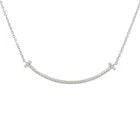 TIFFANY & CO. T SMILE DIAMOND PENDANT, SMALL 18K WHITE GOLD CHAIN RETAIL $3450: TIFFANY & CO. T SMILE DIAMOND PENDANT, SMALL 18K WHITE GOLD CHAIN RETAIL $3450 TIFFANY & CO. T SMILE DIAMOND PENDANT, SMALL 18K WHITE GOLD CHAIN RETAIL $3450 Add a touch of elegance to any outfit with