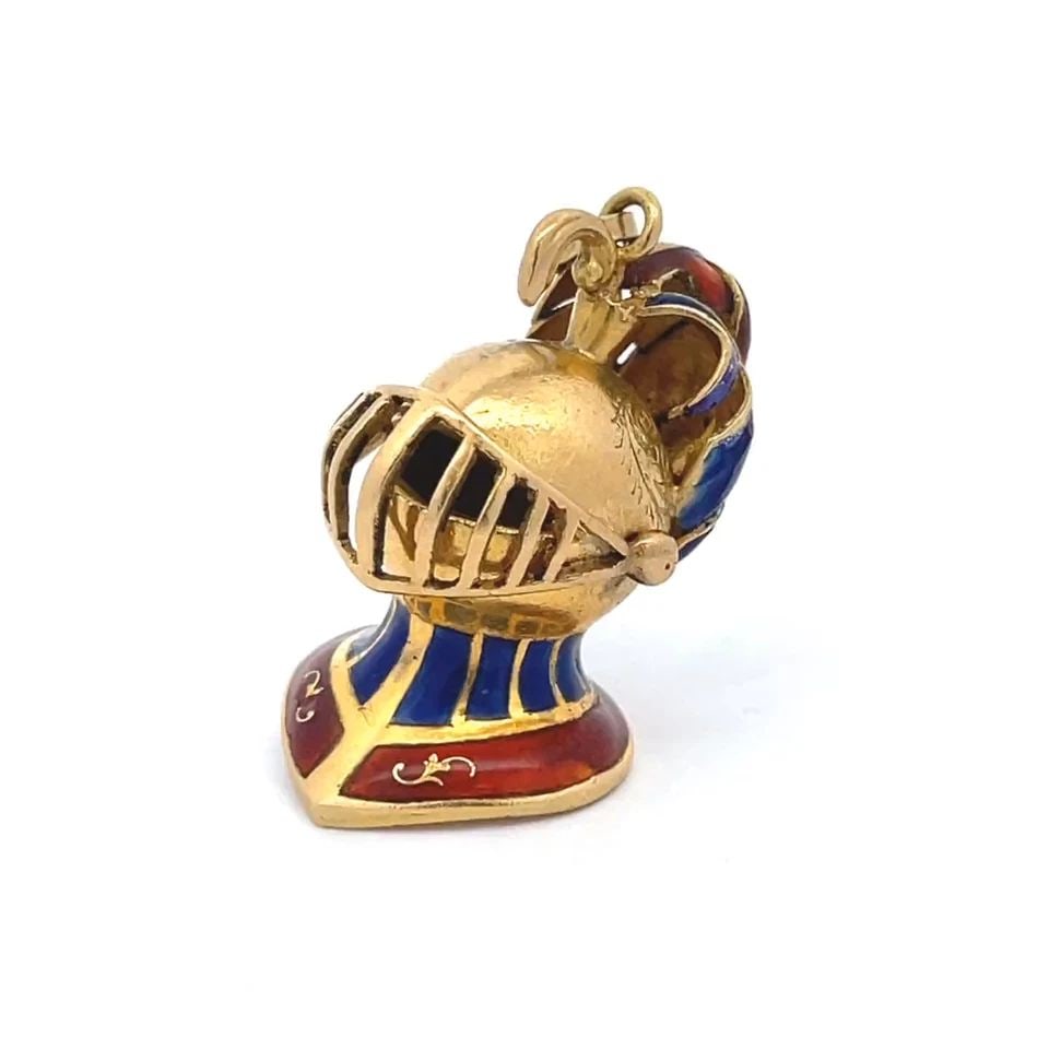 KNIGHT'S HELMET W/PLUME PENDANT VINTAGE 18K YELLOW GOLD RED BLUE ENAMEL: KNIGHT'S HELMET W/PLUME PENDANT VINTAGE 18K YELLOW GOLD RED BLUE ENAMEL KNIGHT'S HELMET W/PLUME PENDANT VINTAGE 18K YELLOW GOLD RED BLUE ENAMEL This is a well sculpted European style knight's helmet w